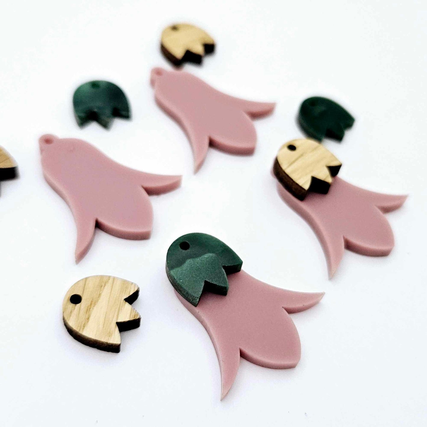 28mm dusty rose acrylic nodding flower dangle blanks shown on their own and with oak wood and green mineral leaf cap pieces
