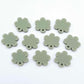 14mm olive green acrylic flower shape earring blanks toppers shown on their own