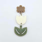 Cream and Olive Green acrylic tulip shape earring blanks shown with one of our iced coffee brown flower toppers