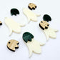 28mm cream acrylic nodding flower dangle blanks shown on their own and with oak wood and green mineral leaf cap pieces