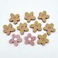 16mm dusty rose organic flower stud blanks with engraved centre, one pair paint filled white and several unfilled pieces shown with protective film on