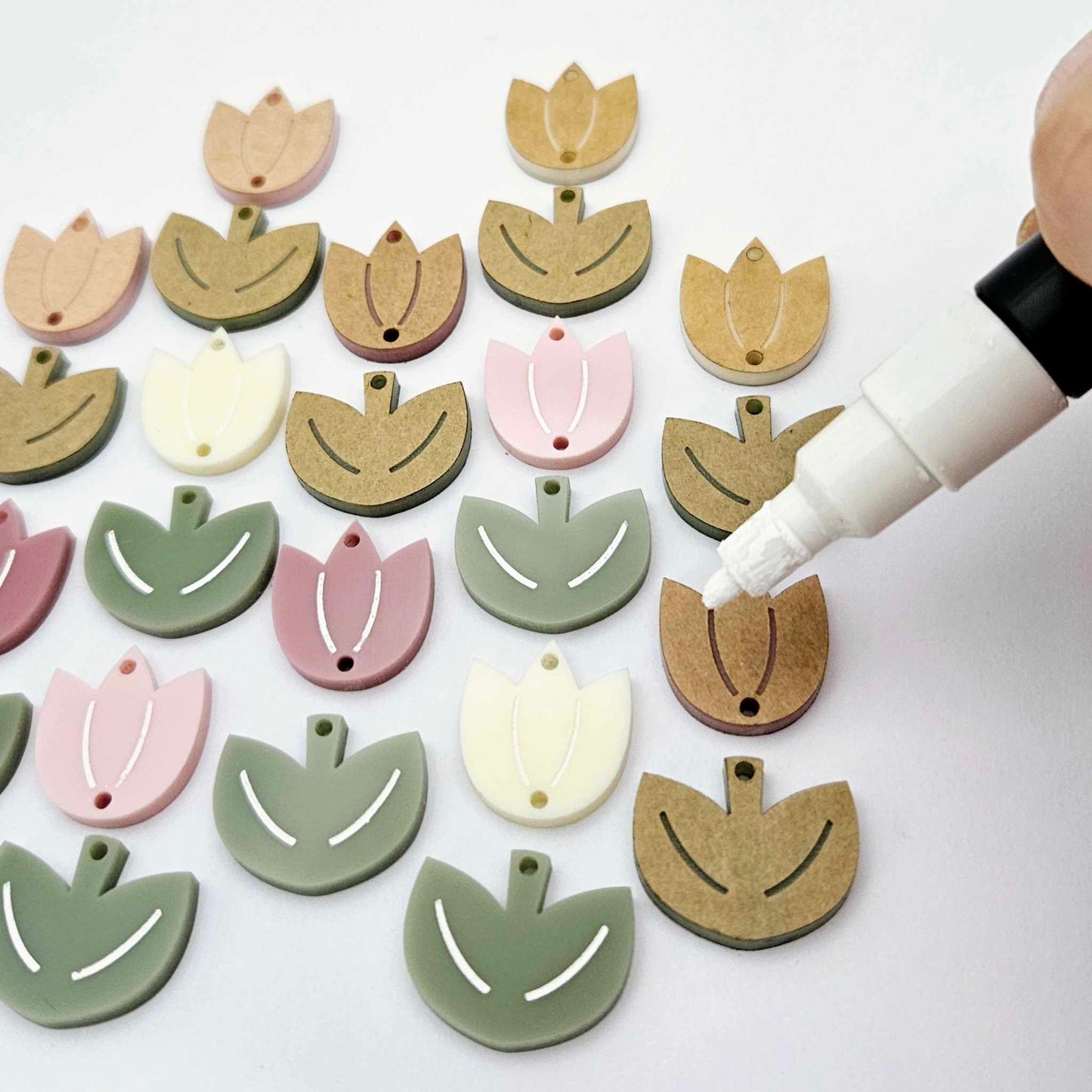 Two-piece tulip acrylic dangle blanks in a mixed pack of solid colours and olive green, paint filled white on some and remaining unfilled