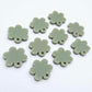 14mm olive green acrylic flower shape earring blanks toppers shown on their own