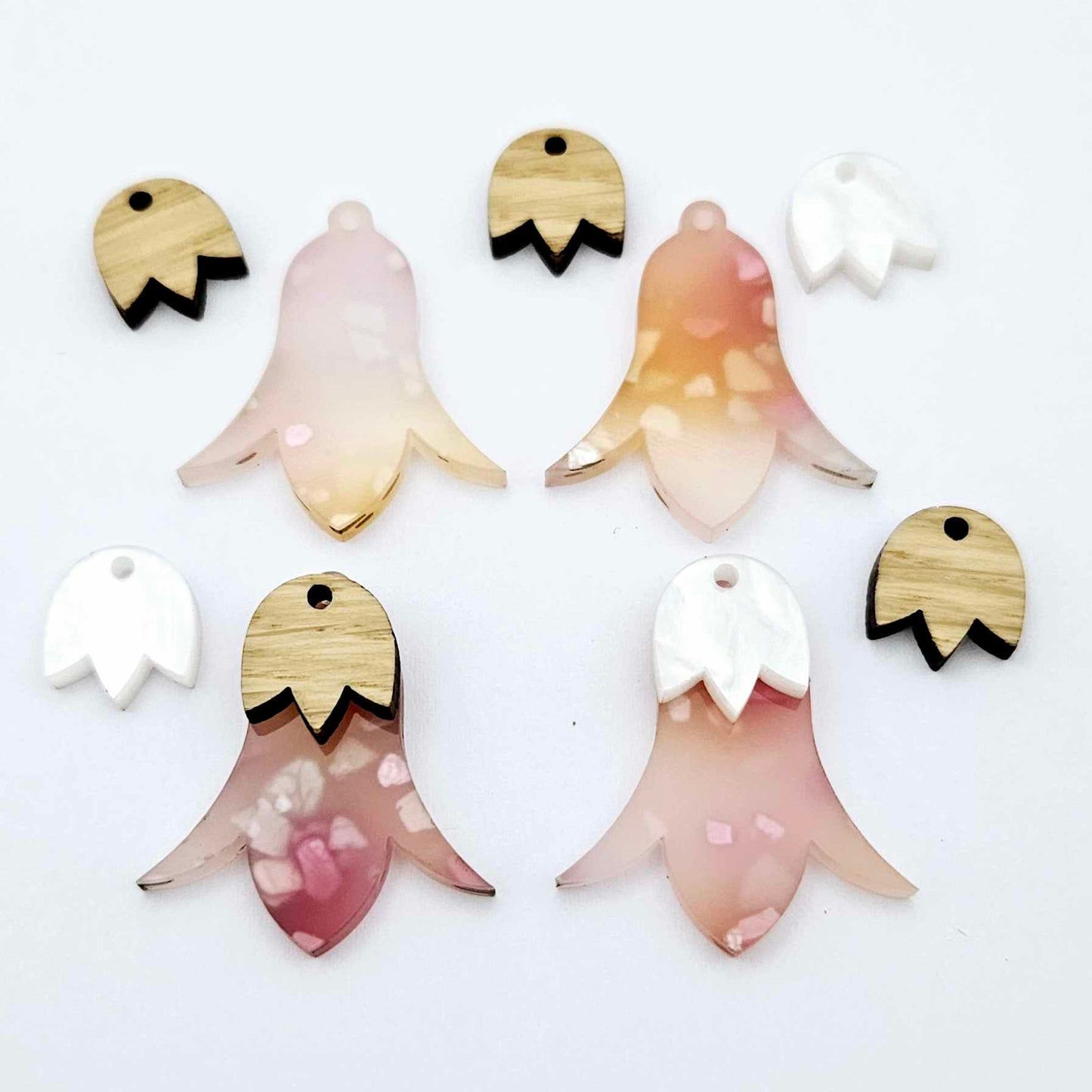 28mm frangipani petal acrylic nodding flower dangle blanks shown on their own and with oak wood and white marble leaf cap pieces