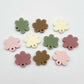 Warm Neutrals flower topper mixed pack showing one pair of each colour with holes, including dusty rose, strawberry milkshake, cream, iced coffee and olive green