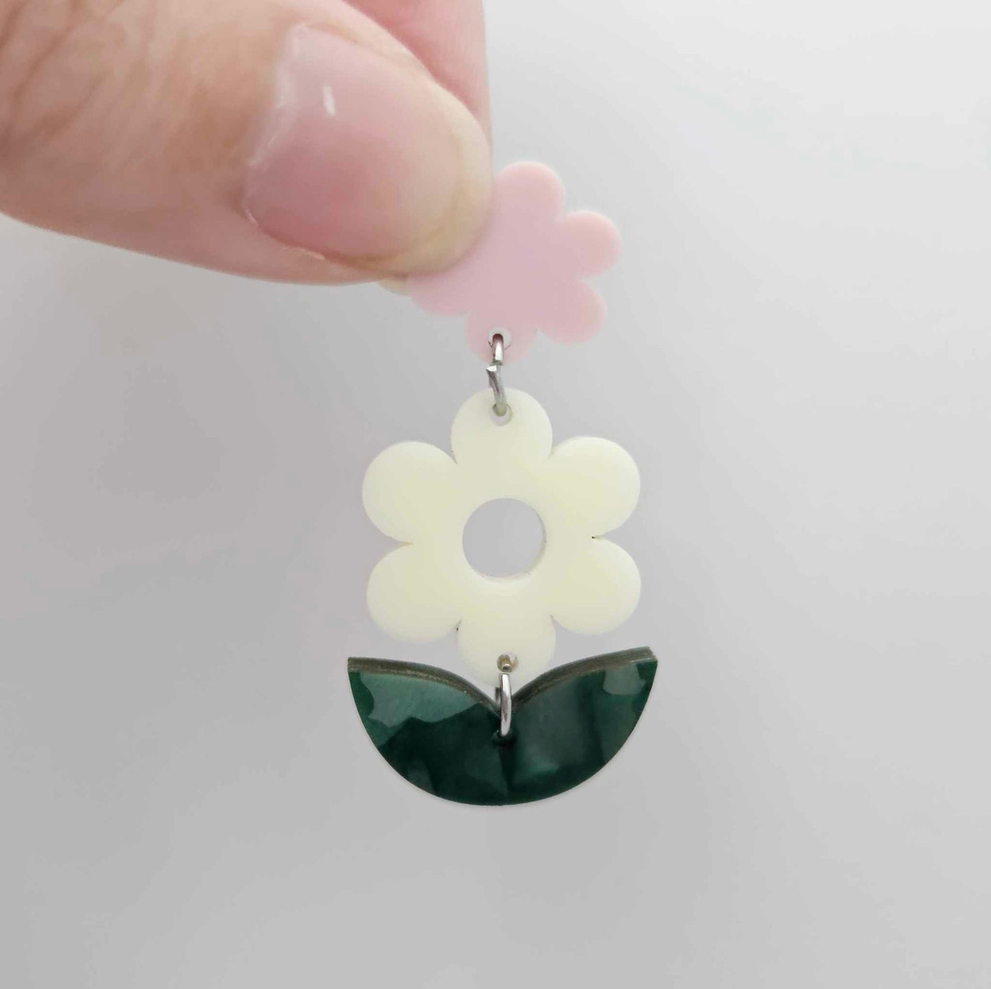Cream flower and green mineral leafy dangles assembled on 20mm hoops, petite two-piece floral earring design