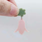 28mm dusty pale pink nodding flower dangle hanging from a 14mm flower topper, shown as a completed earring design