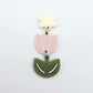 Assembled dusty pale pink and olive green acrylic tulip dangle hanging from a 14mm flower topper, engraved detail paint filled white
