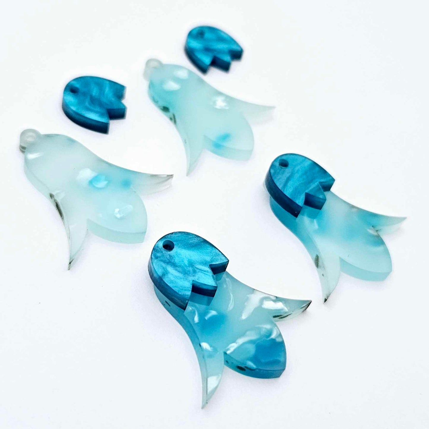 28mm periwinkle petal acrylic nodding flower dangle blanks shown on their own and with ocean blue marble leaf cap pieces