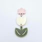 Cream and Olive Green acrylic tulip shape earring blanks shown with one of our strawberry milkshake pink flower toppers