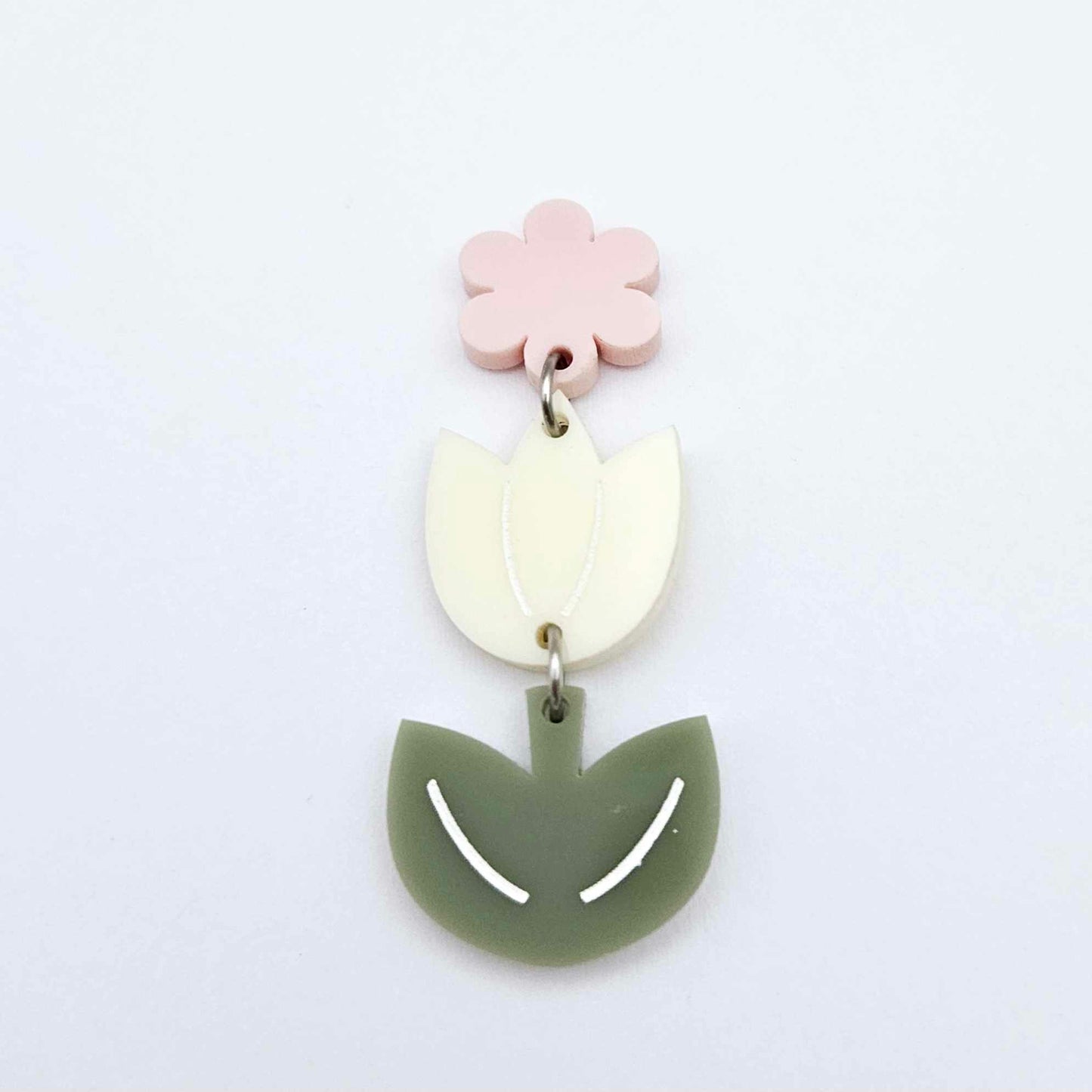 Cream and Olive Green acrylic tulip shape earring blanks shown with one of our strawberry milkshake pink flower toppers