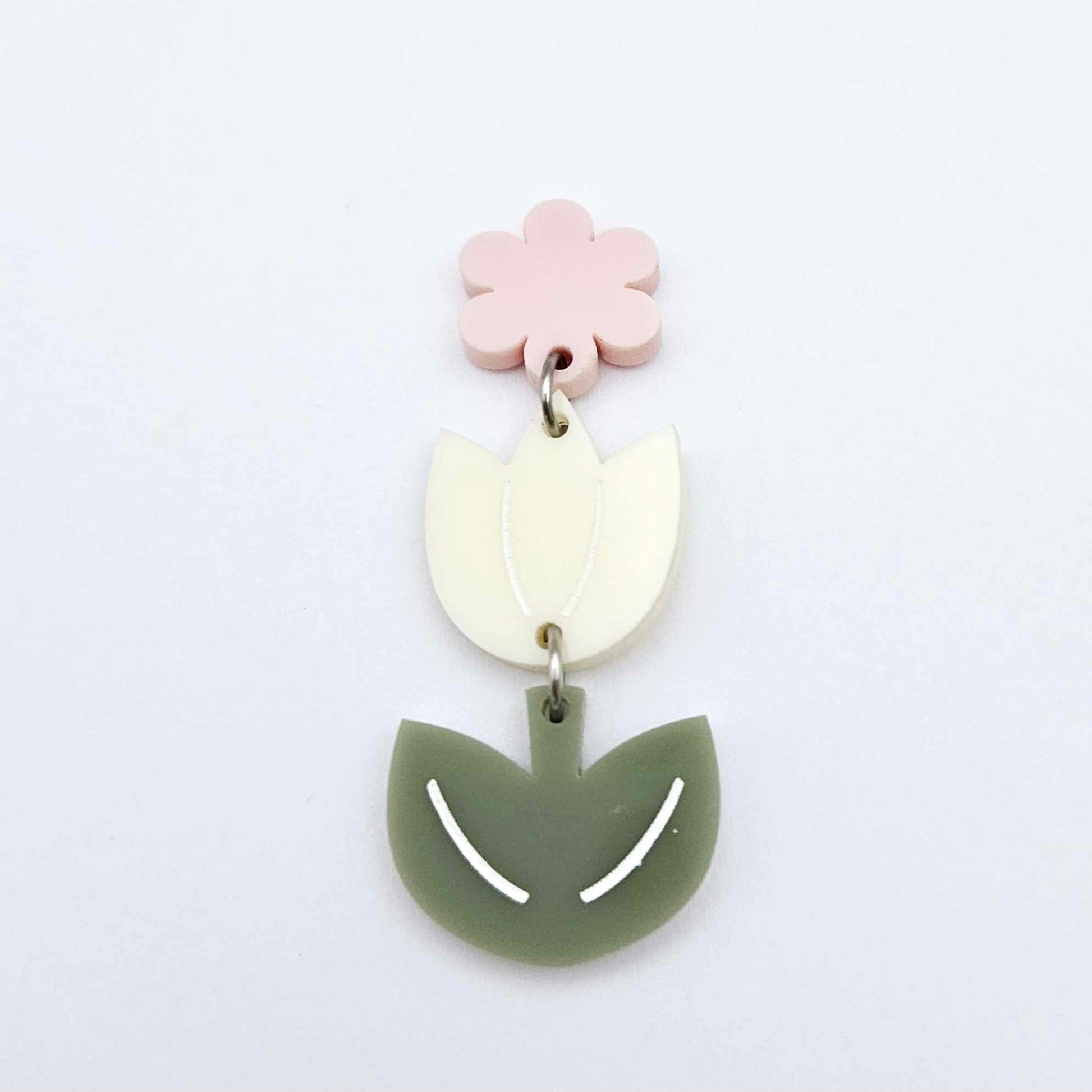 Cream and Olive Green acrylic tulip shape earring blanks shown with one of our strawberry milkshake pink flower toppers
