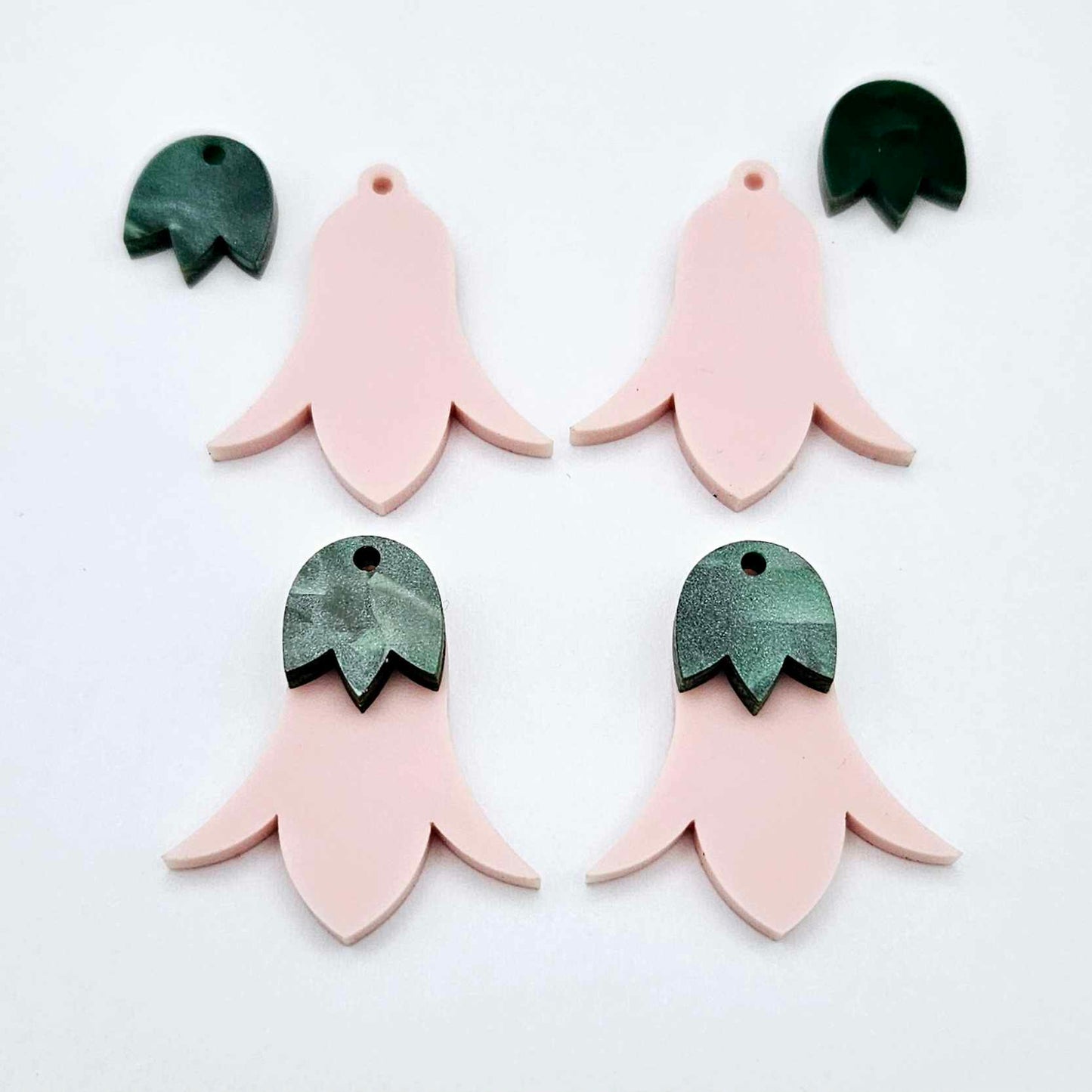 28mm dusty pale pink nodding flower dangle blanks shown on their own and with green mineral leaf cap pieces