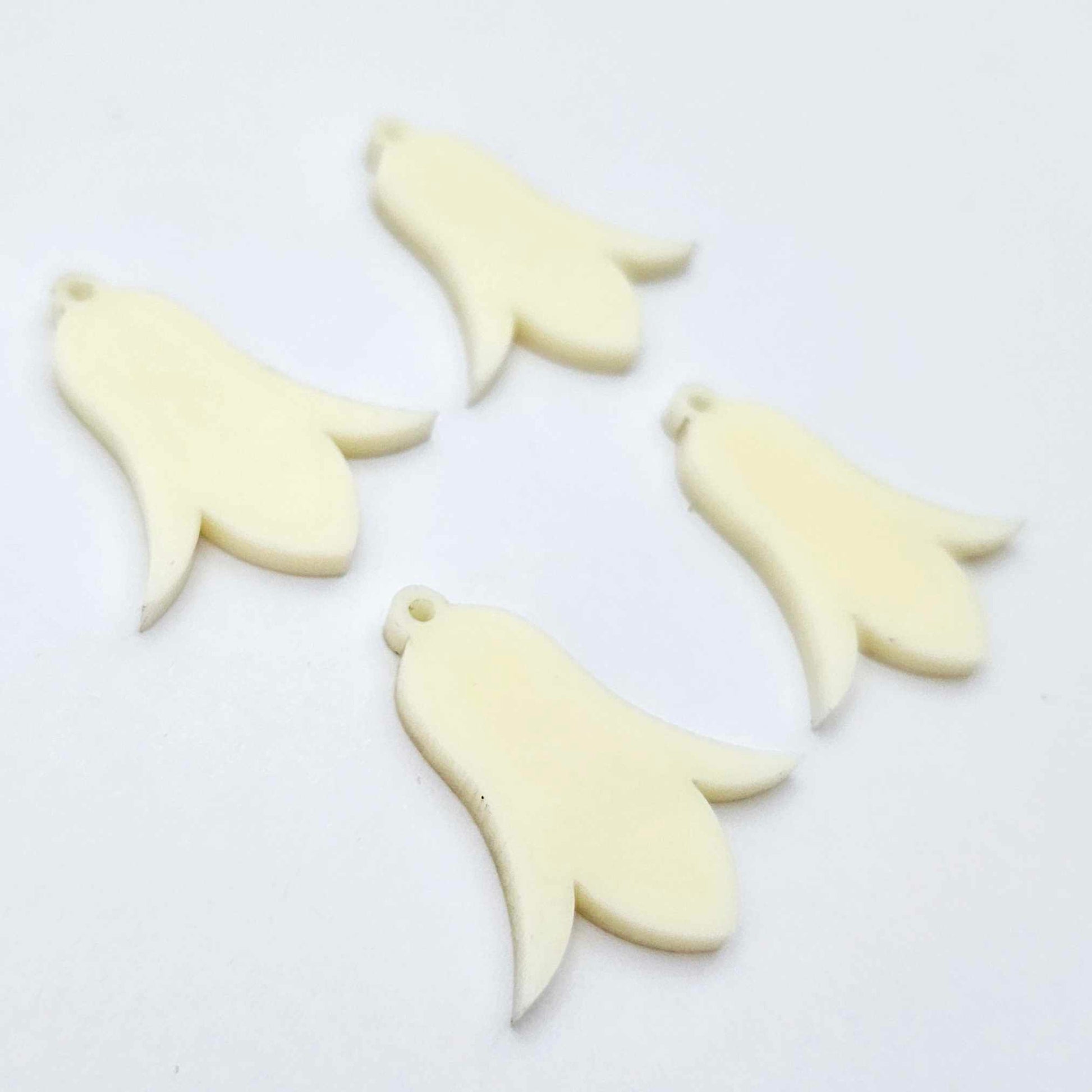 28mm cream acrylic nodding flower dangle blanks shown on their own