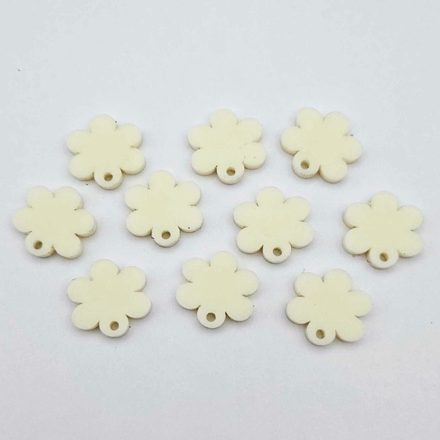 14mm cream acrylic flower shape earring blanks toppers shown on their own