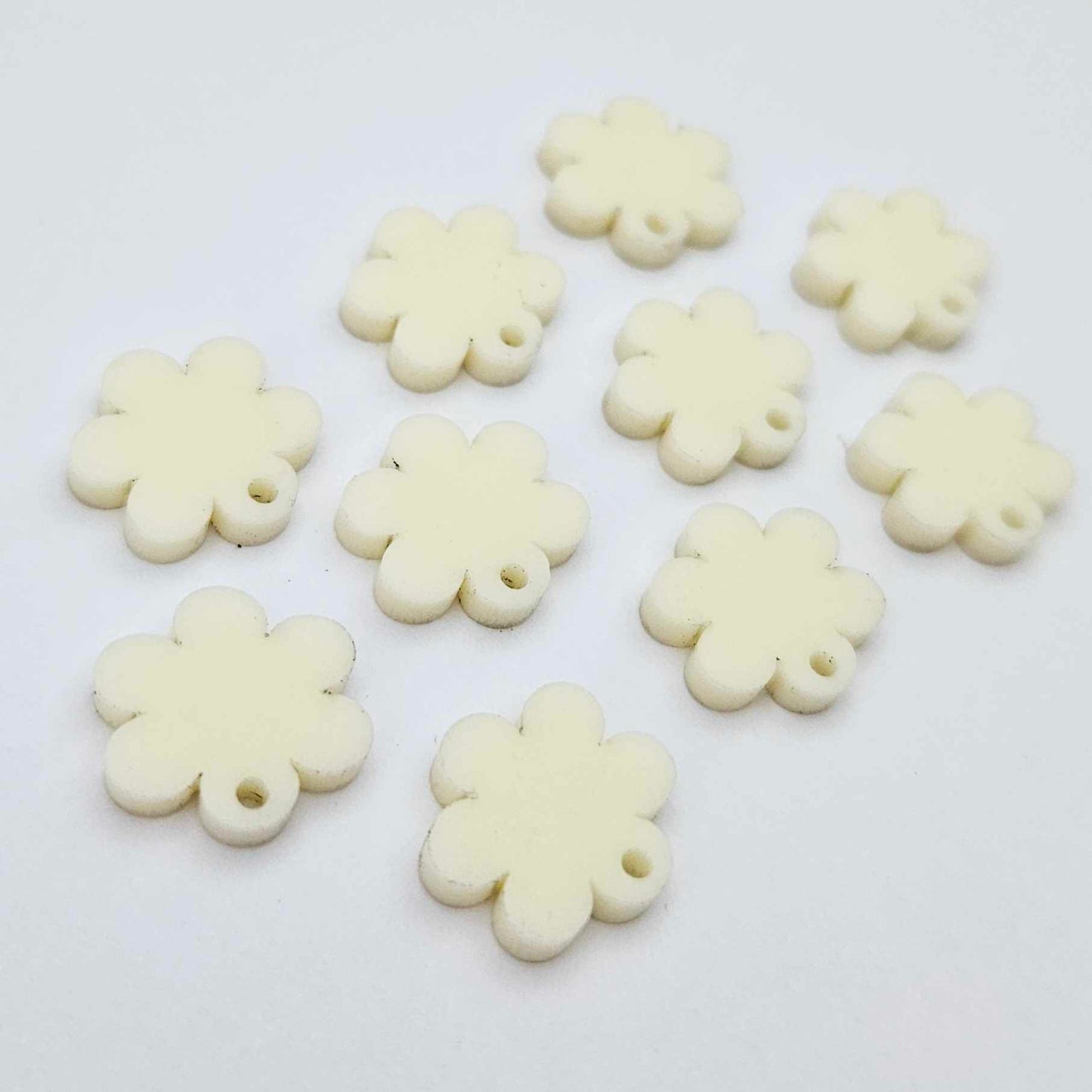 14mm cream acrylic flower shape earring blanks toppers shown on their own