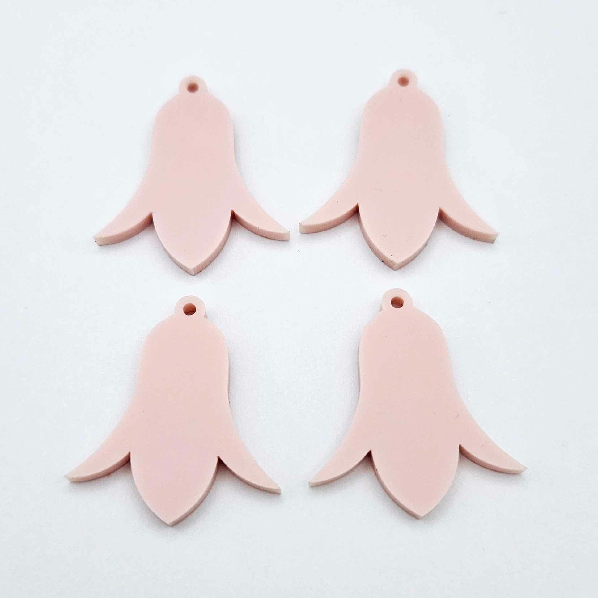 28mm dusty pale pink nodding flower dangle blanks shown on their own 