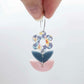 Assembled three-piece acrylic flower dangle hanging from a 20mm hoop, UV printed Hawaii Dream flower with bluestone and strawberry milkshake leaf layers
