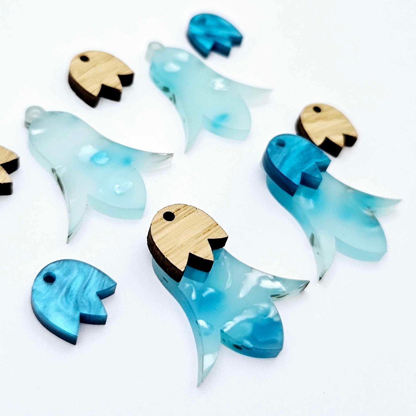 28mm periwinkle petal acrylic nodding flower dangle blanks shown on their own and with oak wood and ocean blue marble leaf cap pieces