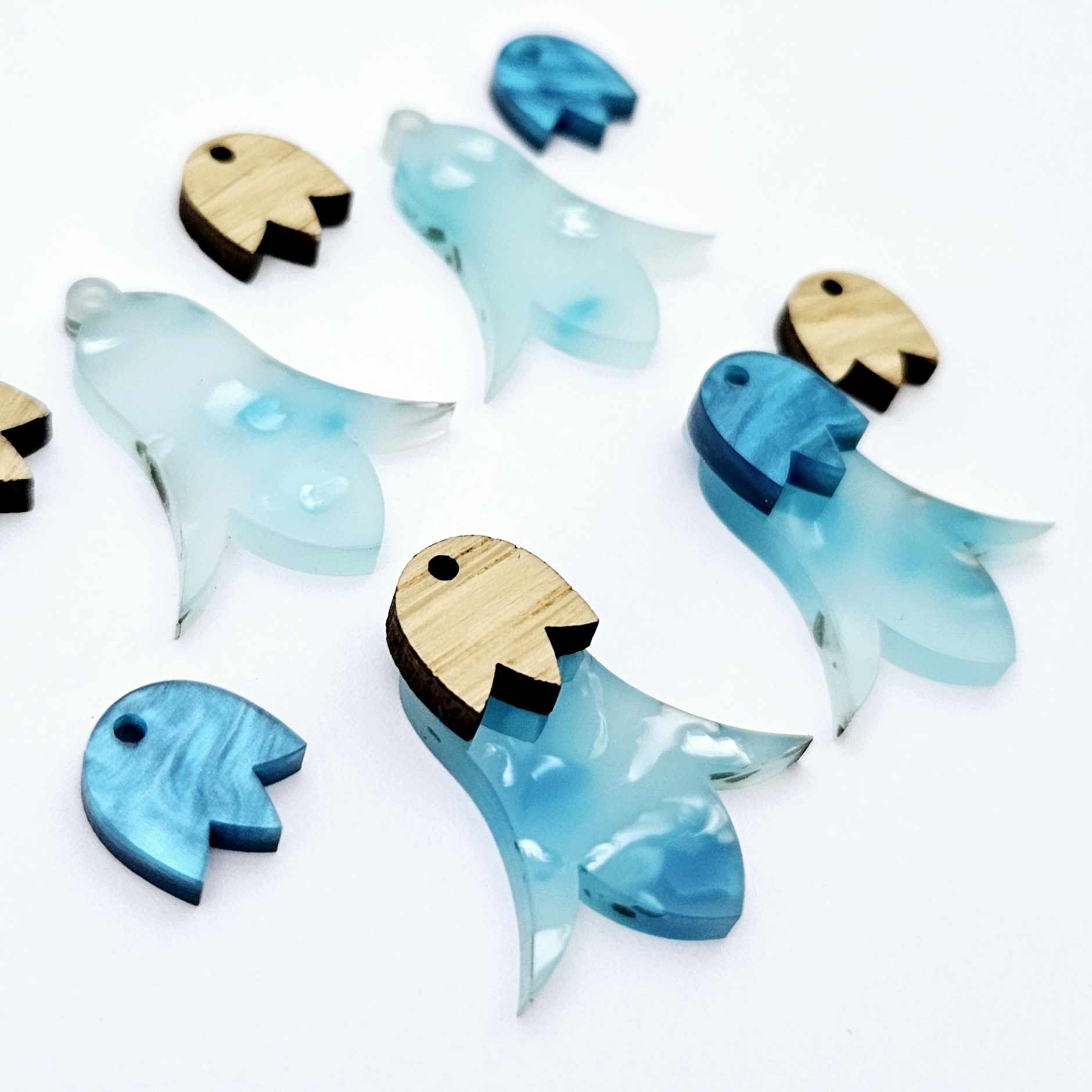 28mm periwinkle petal acrylic nodding flower dangle blanks shown on their own and with oak wood and ocean blue marble leaf cap pieces