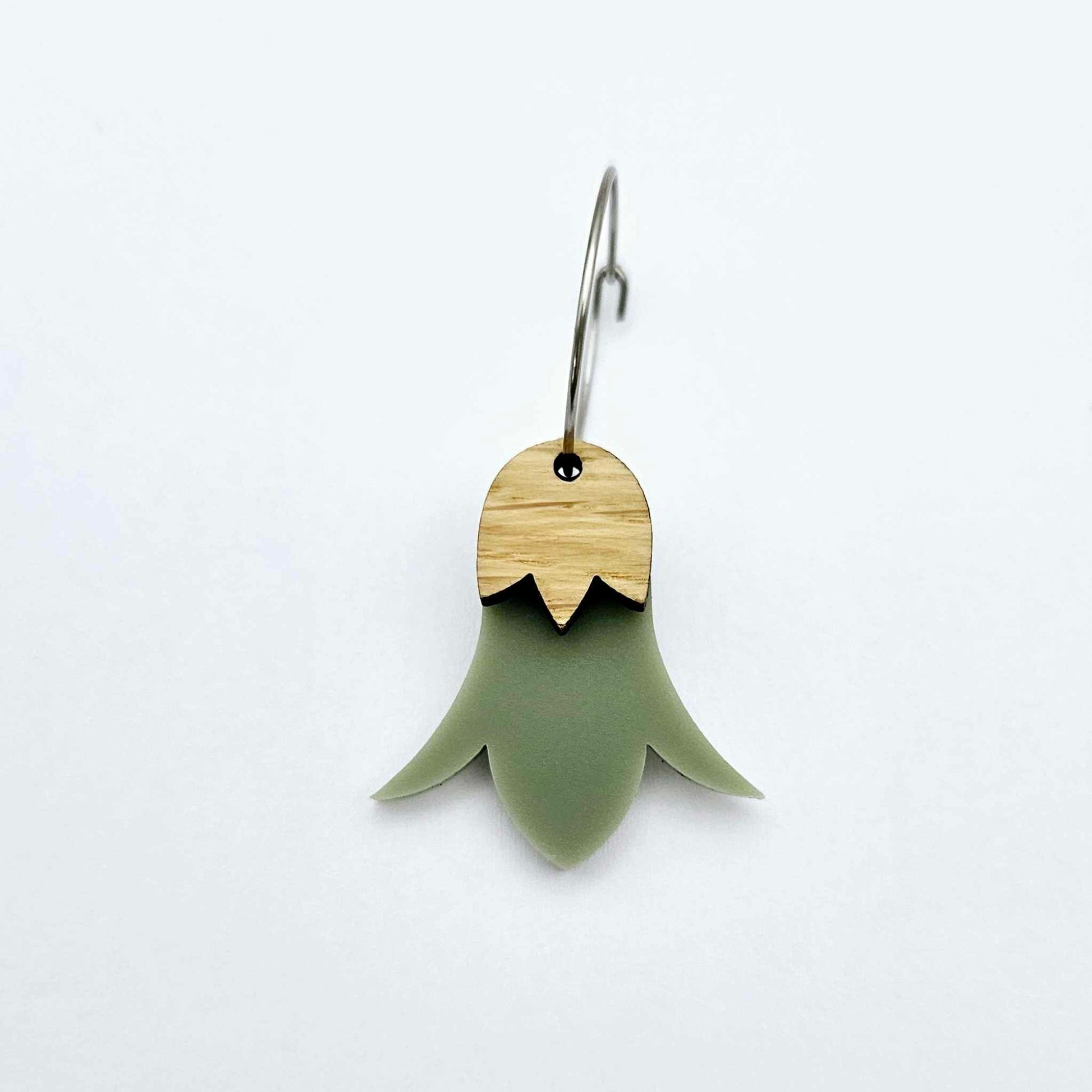 Olive green acrylic nodding flower dangle blanks assembled on 20mm hoops with leaf cap detail for a layered botanical flower look