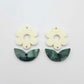 Two-piece cream flower and green mineral leafy dangle blanks shown unassembled and laying flat to display the full 31mm floral design