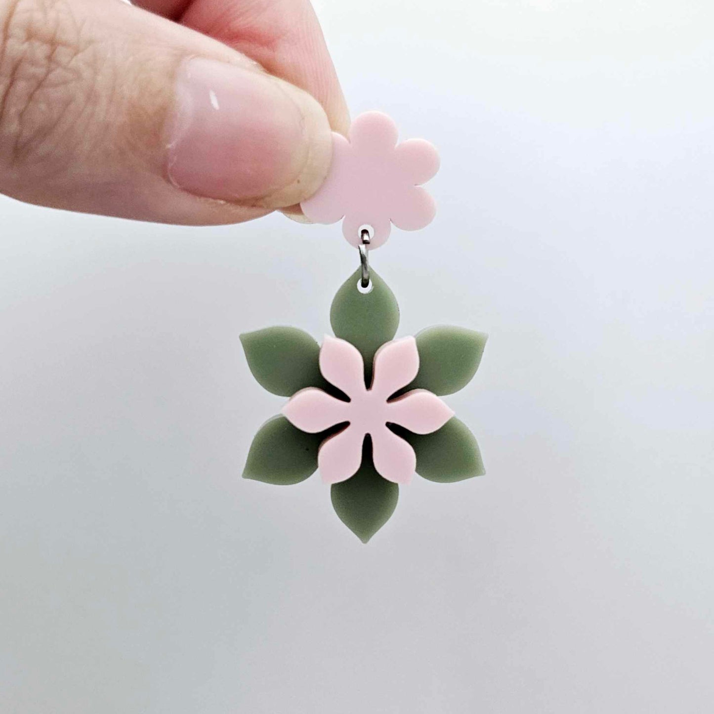 Layered olive green and strawberry milkshake flower dangle assembled and hanging from a strawberry milkshake flower topper, 3D two tone floral design