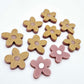 16mm dusty rose organic flower stud blanks with engraved centre, one pair paint filled white and several unfilled pieces shown with protective film on