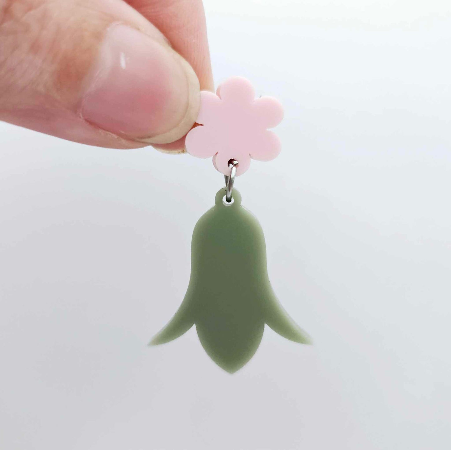 28mm olive green acrylic nodding flower dangle hanging from a 14mm flower topper, shown as a completed earring design