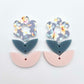 Three-piece acrylic flower dangle blanks shown unassembled laying flat, featuring Hawaii Dream UV printed flower, bluestone leafy middle and strawberry milkshake leafy bottom