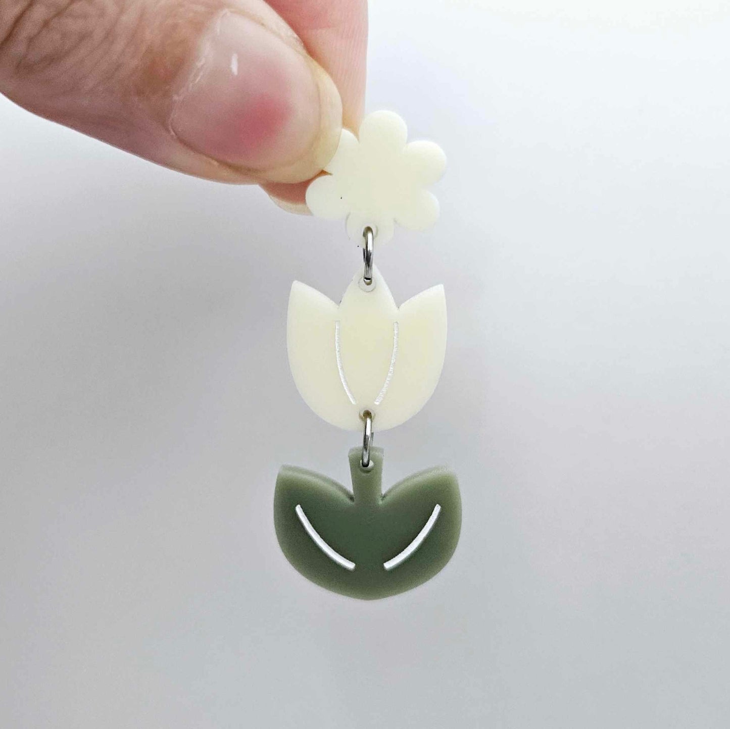 Cream and Olive Green acrylic tulip shape earring blanks shown with a cream flower toppers