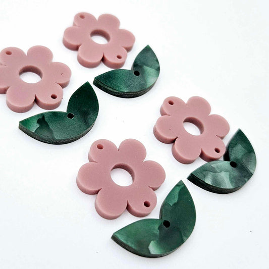Two-piece dusty rose flower and green mineral acrylic leafy dangle blanks shown unassembled and laying flat to display the full 31mm floral design