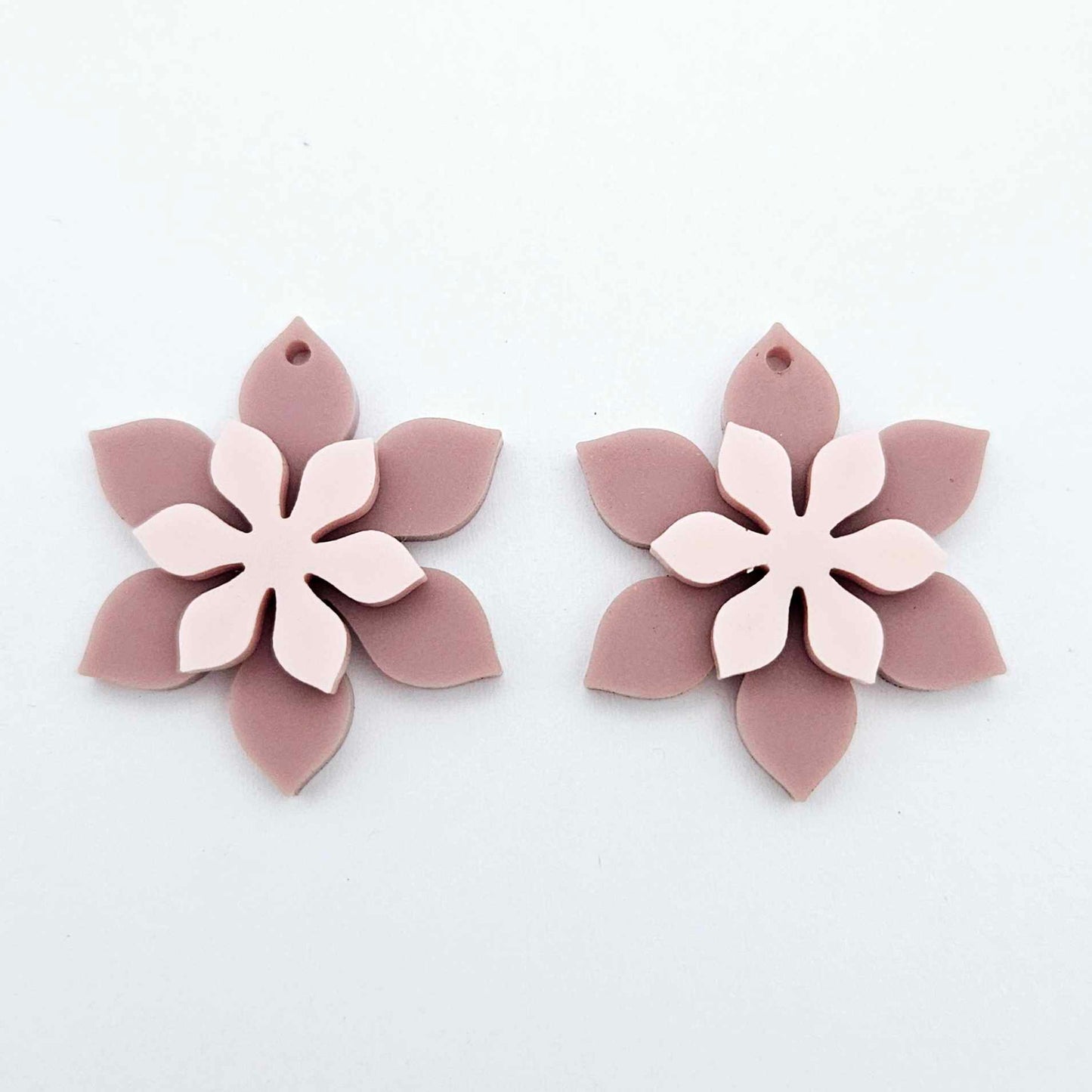 Dusty rose and strawberry milkshake two layer flower dangle blanks shown laying flat, with flowers stacked to show layered effect