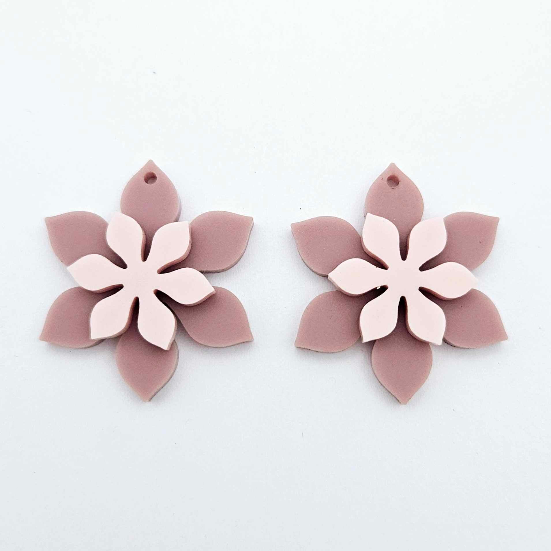 Dusty rose and strawberry milkshake two layer flower dangle blanks shown laying flat, with flowers stacked to show layered effect