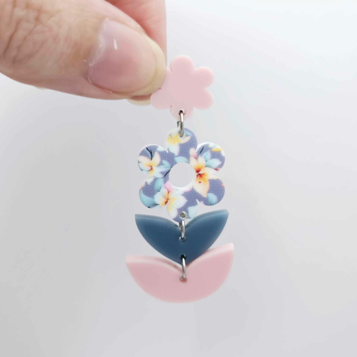 Assembled three-piece acrylic floral dangle hanging from a 14mm strawberry milkshake flower topper, Hawaii Dream UV printed flower with layered leaf pieces