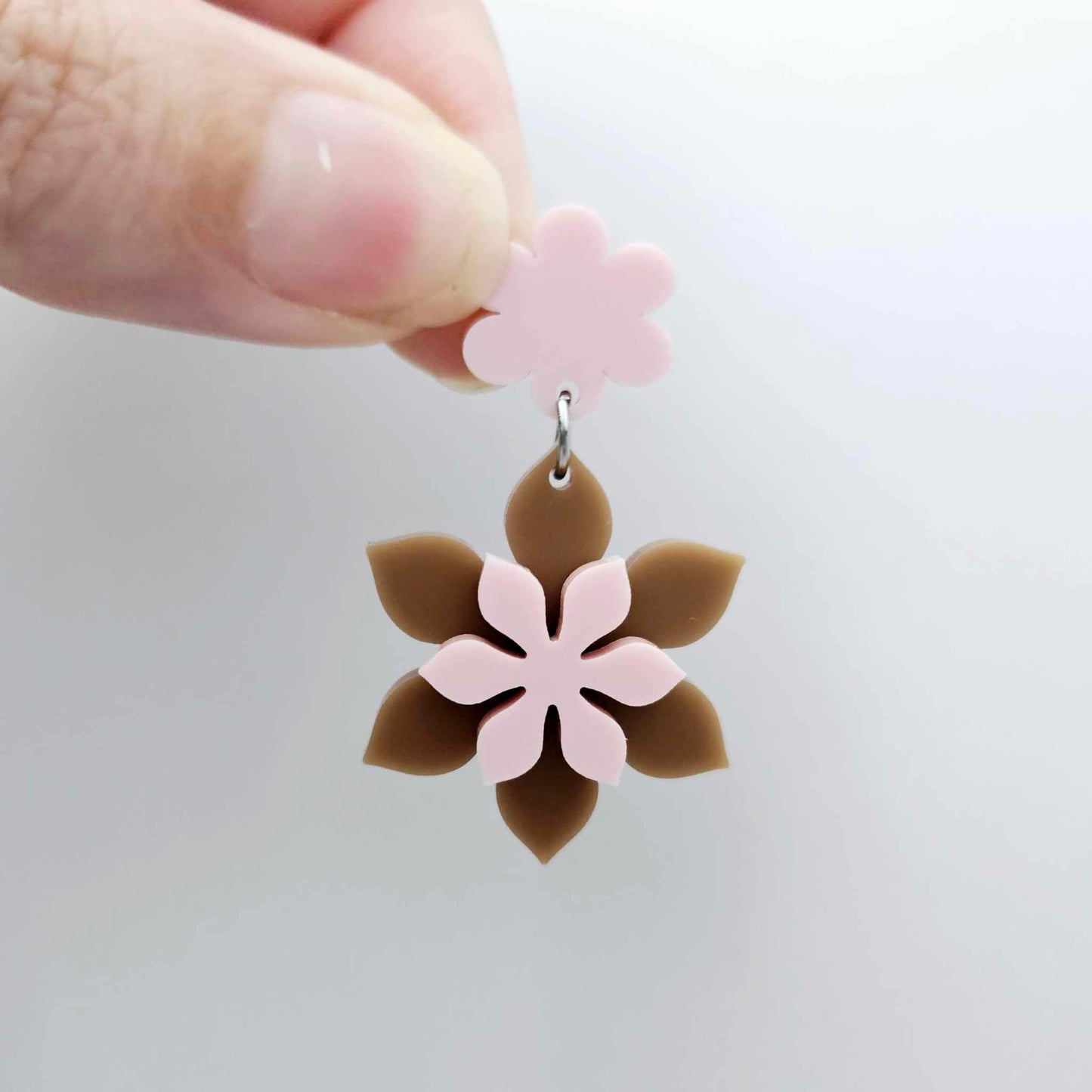 Layered iced coffee and strawberry milkshake flower dangle assembled and hanging from a strawberry milkshake flower topper, 3D two tone floral design