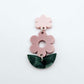 Assembled dusty rose and green mineral acrylic flower dangles hanging from strawberry milkshake flower toppers, layered botanical earring design