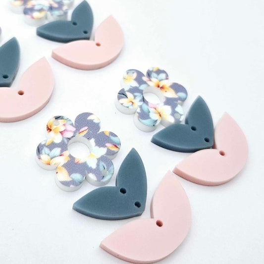 Three-piece acrylic flower dangle blanks shown unassembled laying flat, featuring Hawaii Dream UV printed flower, bluestone leafy middle and strawberry milkshake leafy bottom