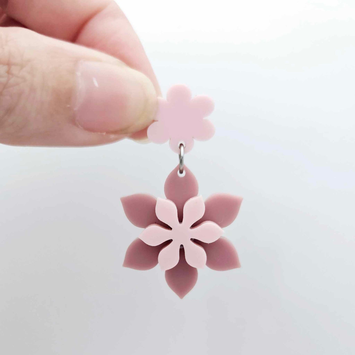 Layered dusty rose and strawberry milkshake flower dangle assembled and hanging from a strawberry milkshake flower topper, 3D two tone floral design
