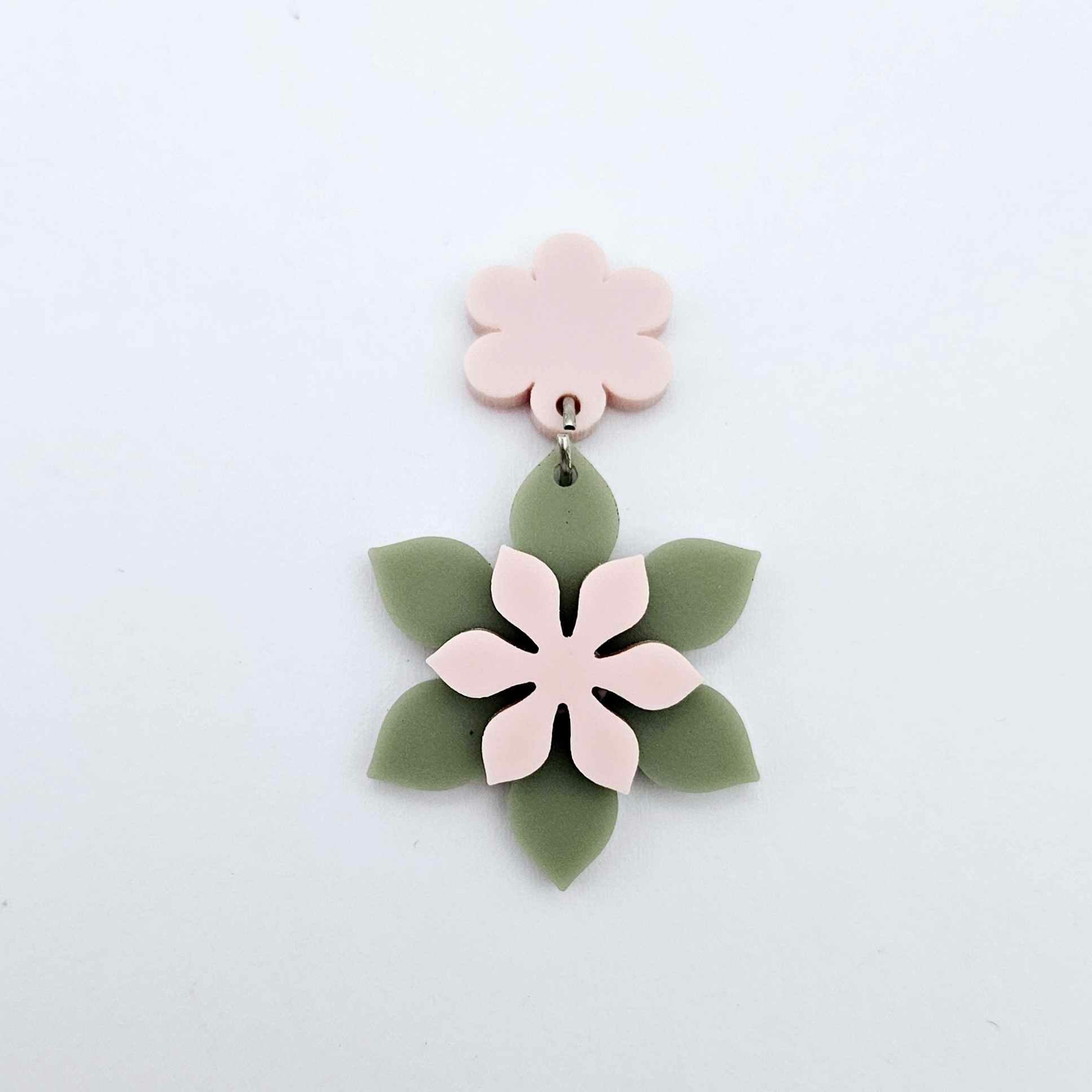 Layered olive green and strawberry milkshake flower dangle assembled and hanging from a strawberry milkshake flower topper, 3D two tone floral design