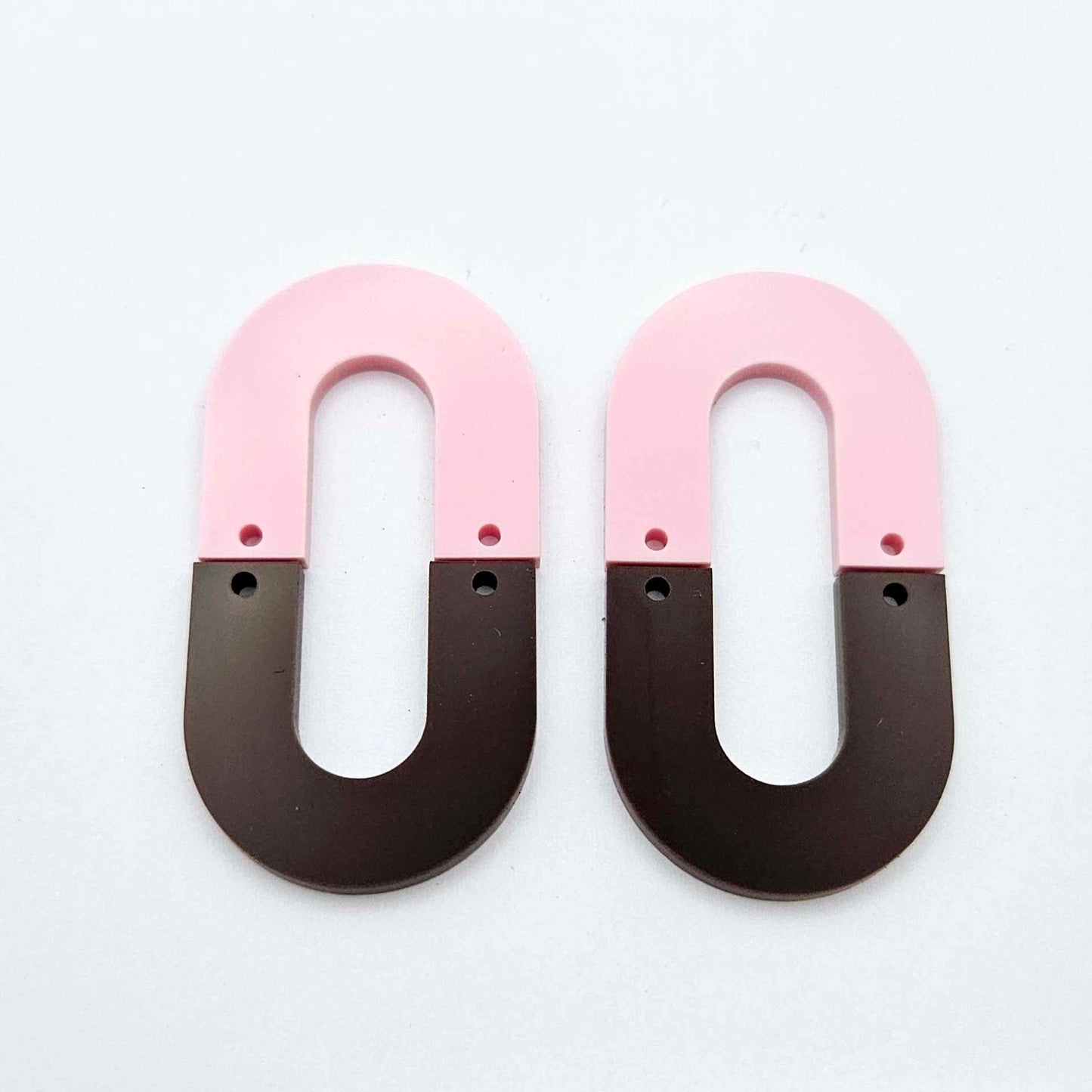 Layered U dangle blanks in pastel pink and chocolate brown acrylic, one pair shown unassembled laying flat with matching U-shaped pieces