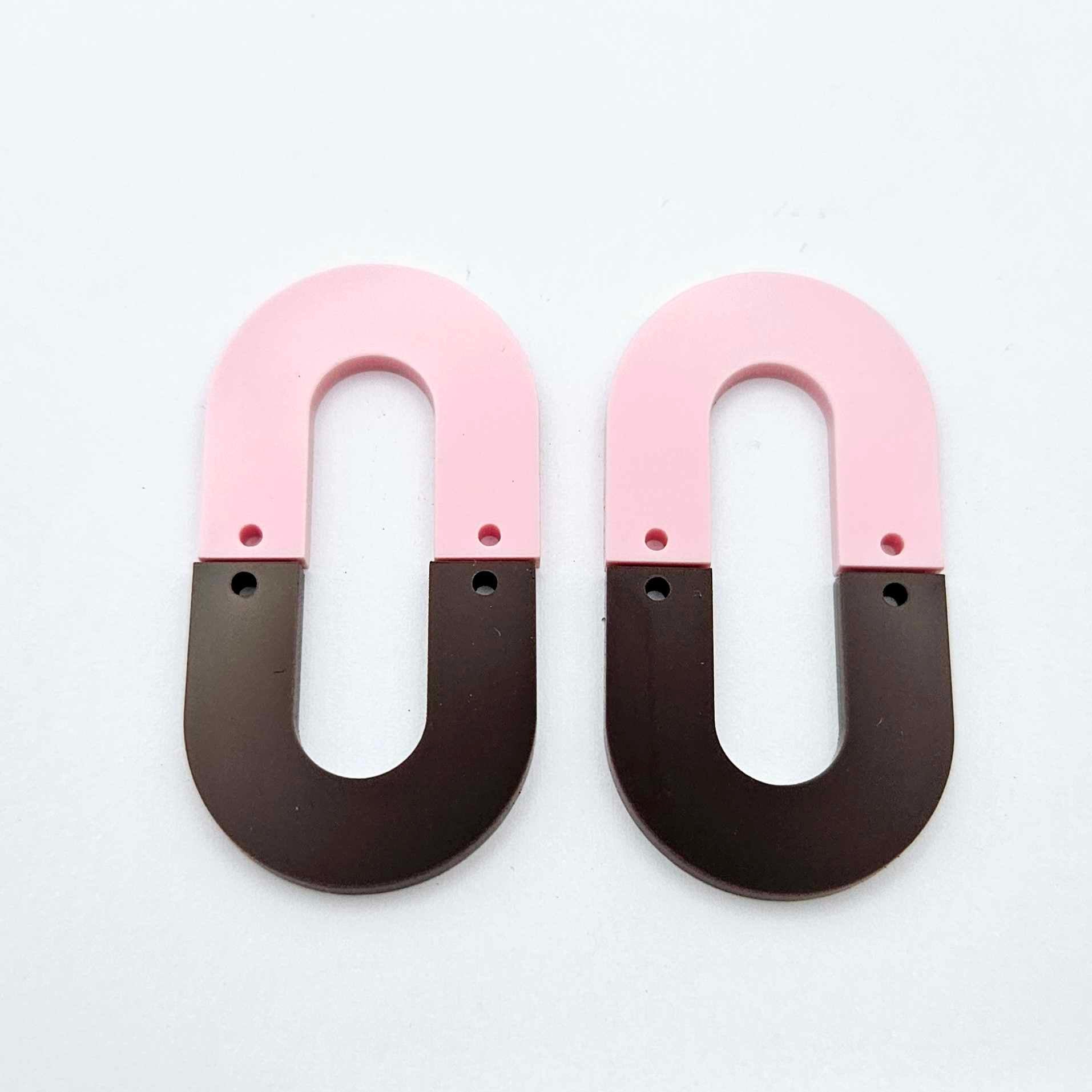 Layered U dangle blanks in pastel pink and chocolate brown acrylic, one pair shown unassembled laying flat with matching U-shaped pieces