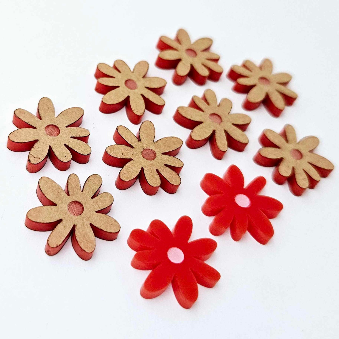 17mm rec acrylic flower stud blanks with engraved centre detail, one pair paint filled light pink and peeled, with additional pieces shown with protective film on