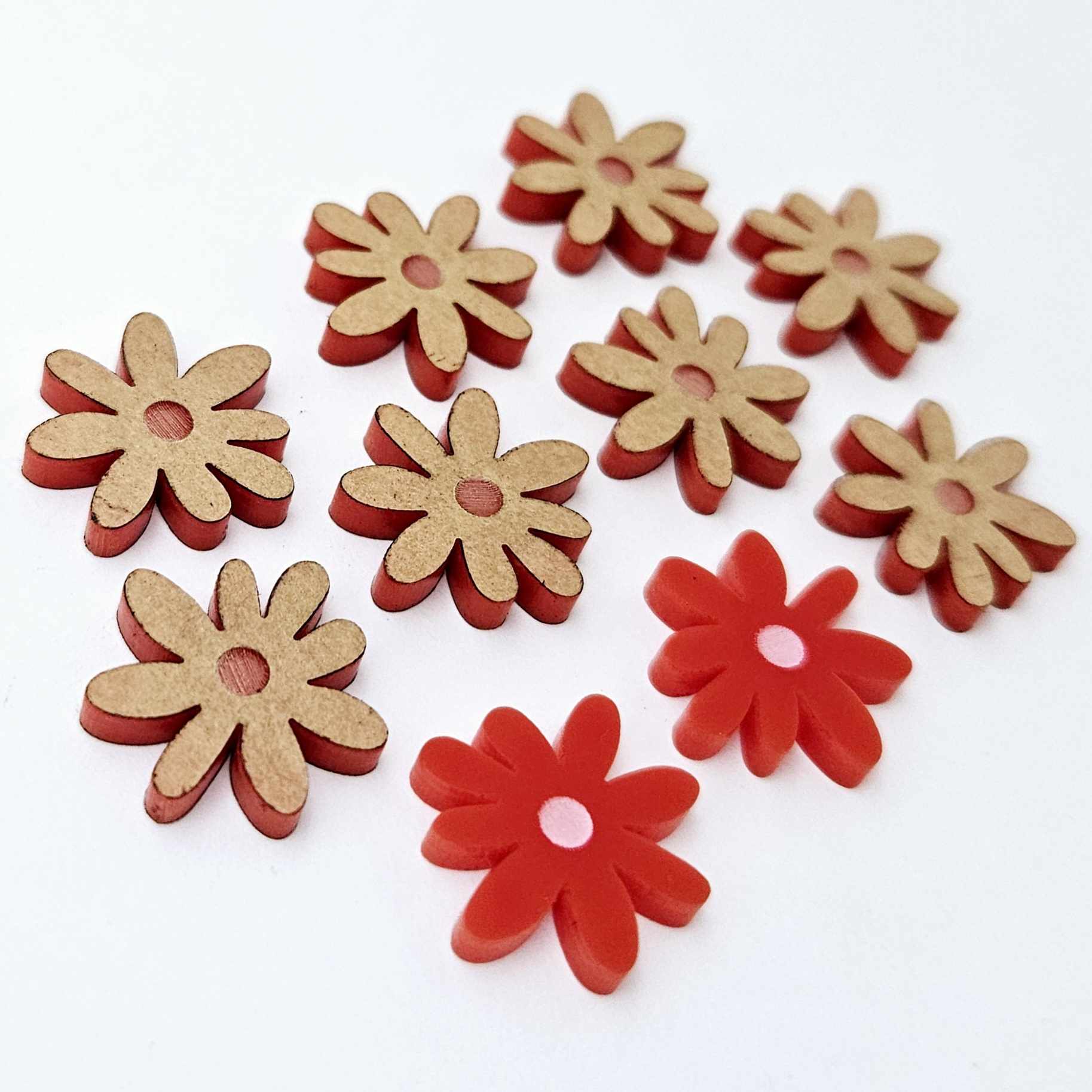 17mm rec acrylic flower stud blanks with engraved centre detail, one pair paint filled light pink and peeled, with additional pieces shown with protective film on