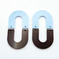 Layered U dangle blanks in pastel blue and chocolate brown acrylic, one pair shown unassembled laying flat with matching U-shaped pieces