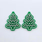 One pair of solid green cookie Christmas tree dangle blanks with engraved icing details paint filled in light pink and white, shown laying flat