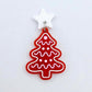 One solid red cookie Christmas tree dangle with engraved icing details paint filled in light pink and white, assembled with a 16mm white star topper