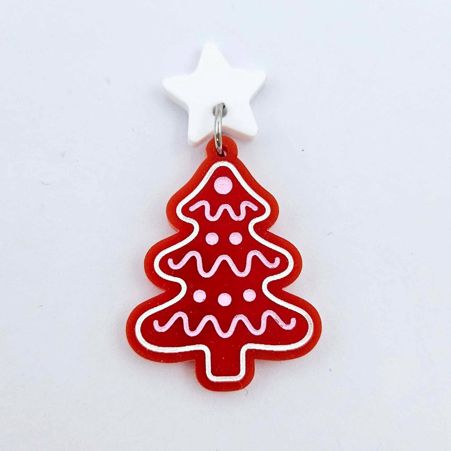 One solid red cookie Christmas tree dangle with engraved icing details paint filled in light pink and white, assembled with a 16mm white star topper