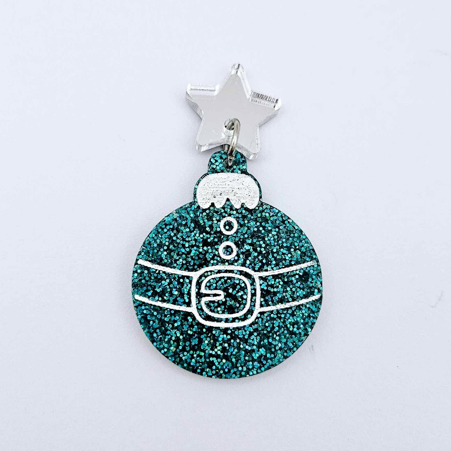 One teal glitter Santa bauble dangle with engraved Santa belt and button details paint filled white, assembled with a 16mm silver mirror star topper