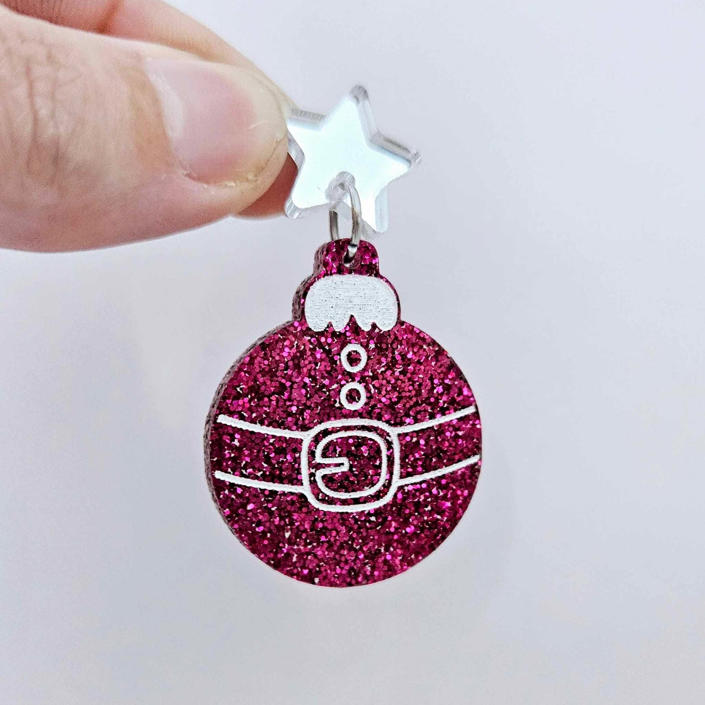 One hot pink glitter Santa bauble dangle with engraved Santa belt and button details paint filled white, assembled with a 16mm silver mirror star topper